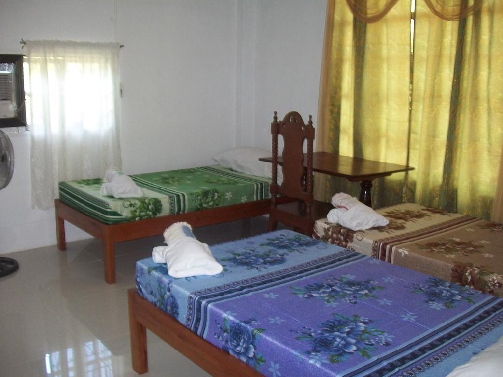 Charm Guest House Puerto Princesa Pokoj fotografie